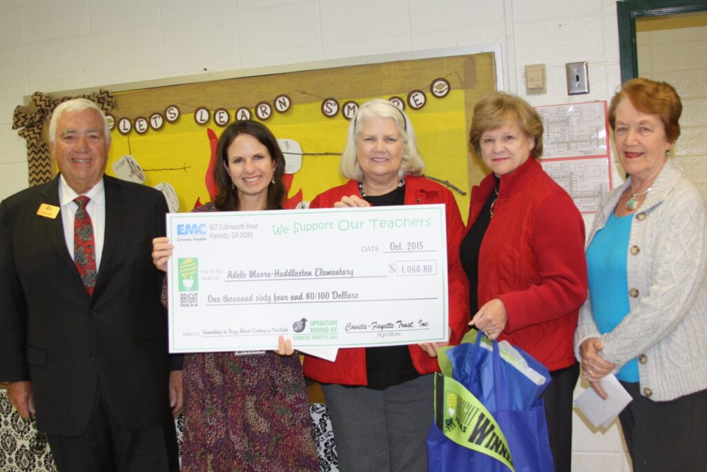 Huddleston Elementary School teacher Adele Moore (second from left) accepts her Bright Ideas award for “Something to Buzz About - Coding with BeeBots” from Operation Round Up Director Bob Reeves and Bright Ideas judges (from l-r) Rachel Colbert, Phyllis King and Wanda Hicks.